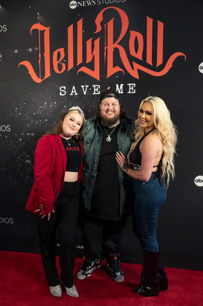 Bailee Ann, Jelly Roll, and Bunnie Xo pose on the red carpet at the 