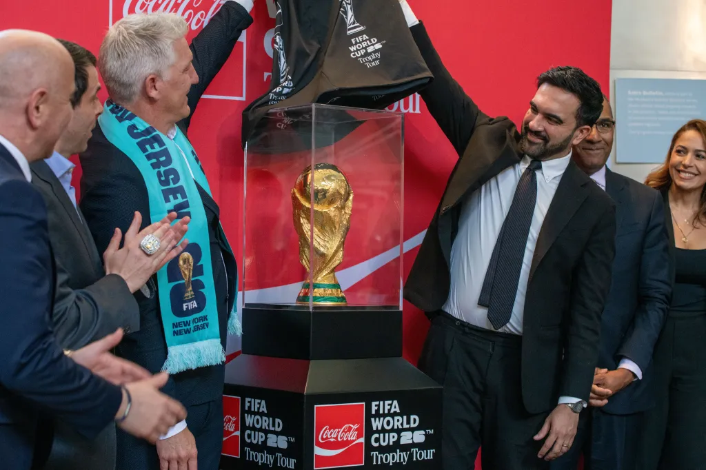 Bastian Schweinsteiger and NYC Mayor Zohran Mamdani unveil the FIFA World Cup trophy.