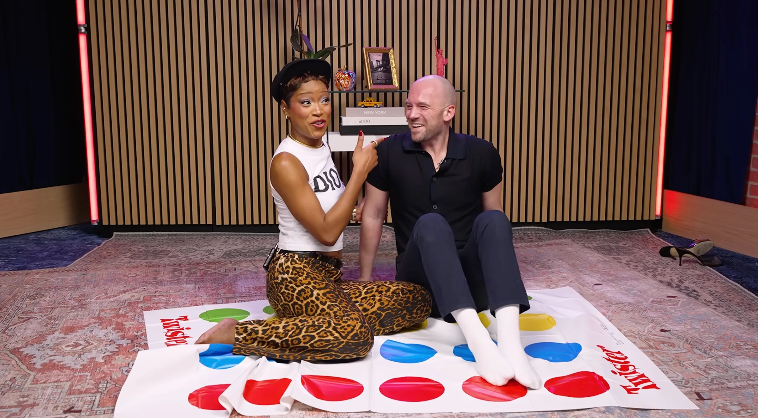 Keke Palmer and Sean Evans playing Twister.