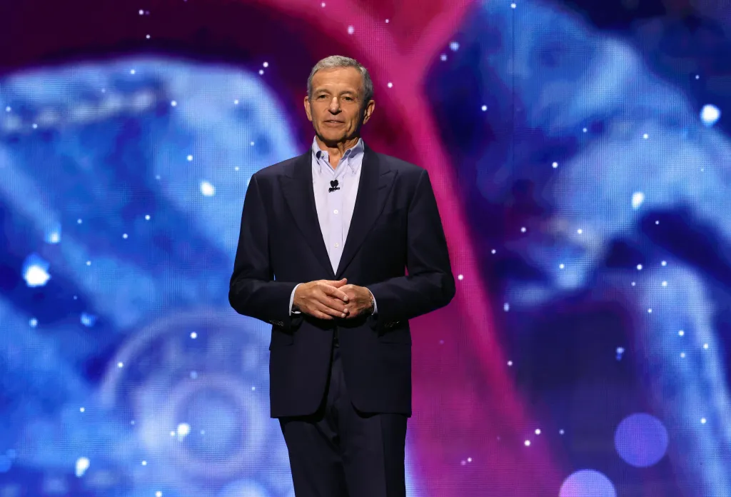 Bob Iger, CEO of The Walt Disney Company, stands on stage at the Disney Entertainment Showcase at D23.