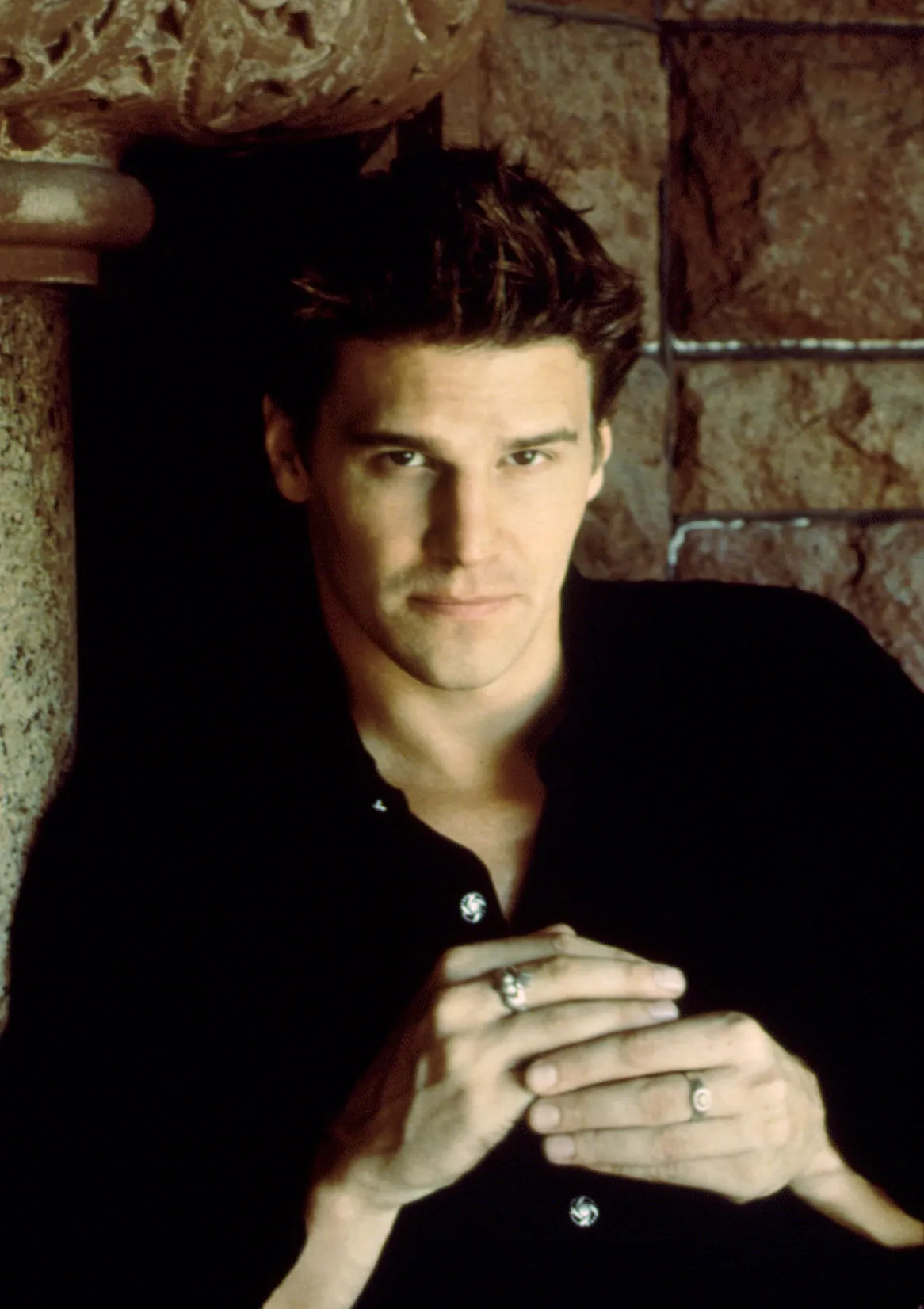 David Boreanaz in a black shirt.