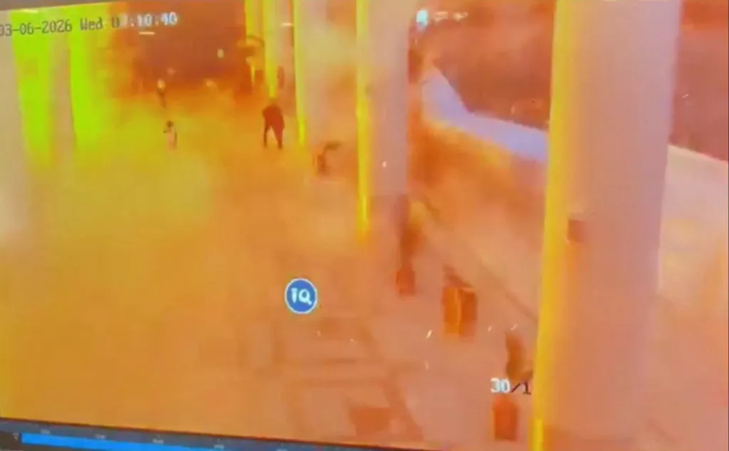 CCTV footage shows people running for cover following a strike on Kuwait International Airport.