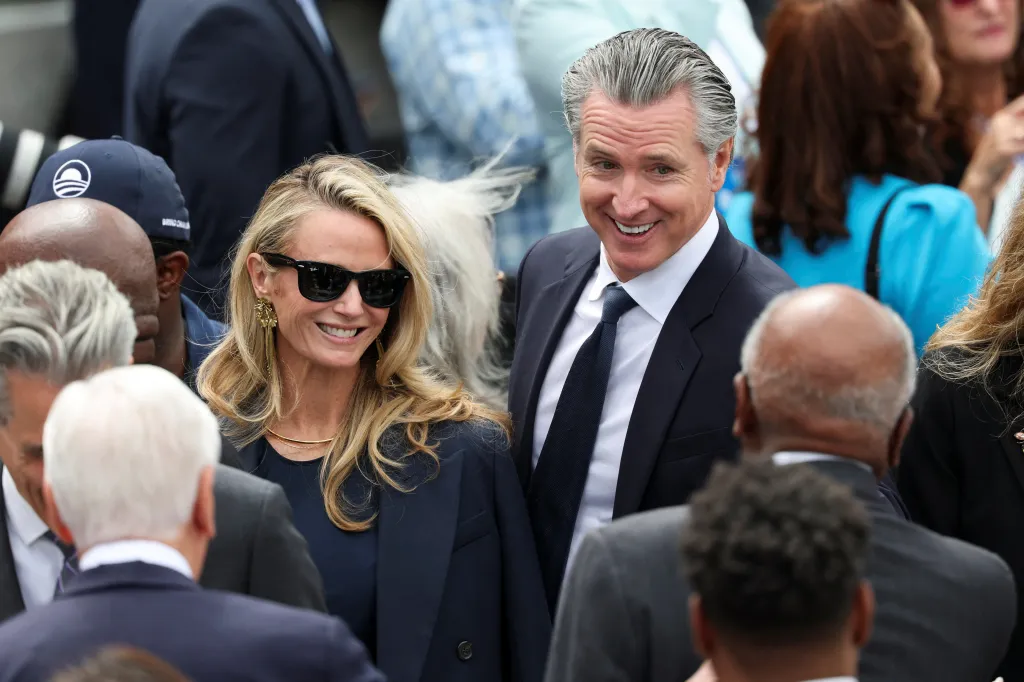 California Governor Gavin Newsom and his wife Jennifer Siebel Newsom attending a dedication ceremony.
