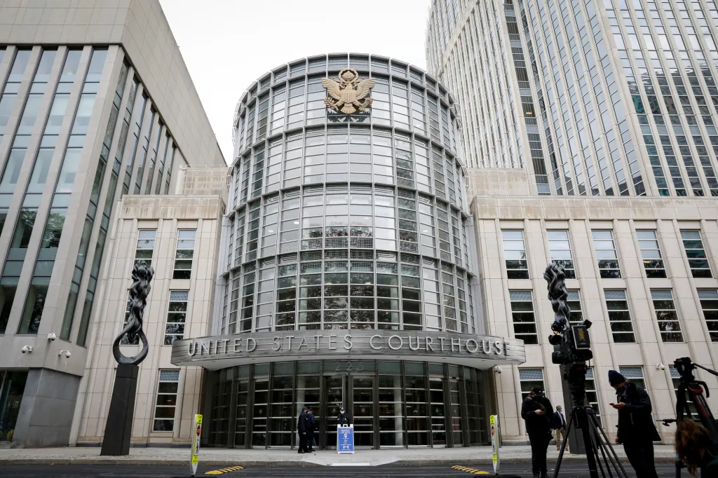 Cameras are set up outside the United States District Court for the Eastern District of New York in Brooklyn.