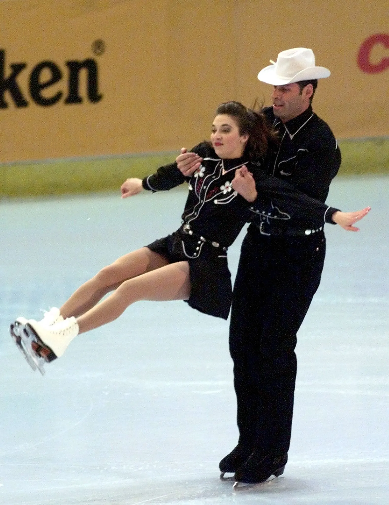 Isabelle Brasseur and Lloyd Eisler perform in the Pairs Technical Figure Skating competition.
