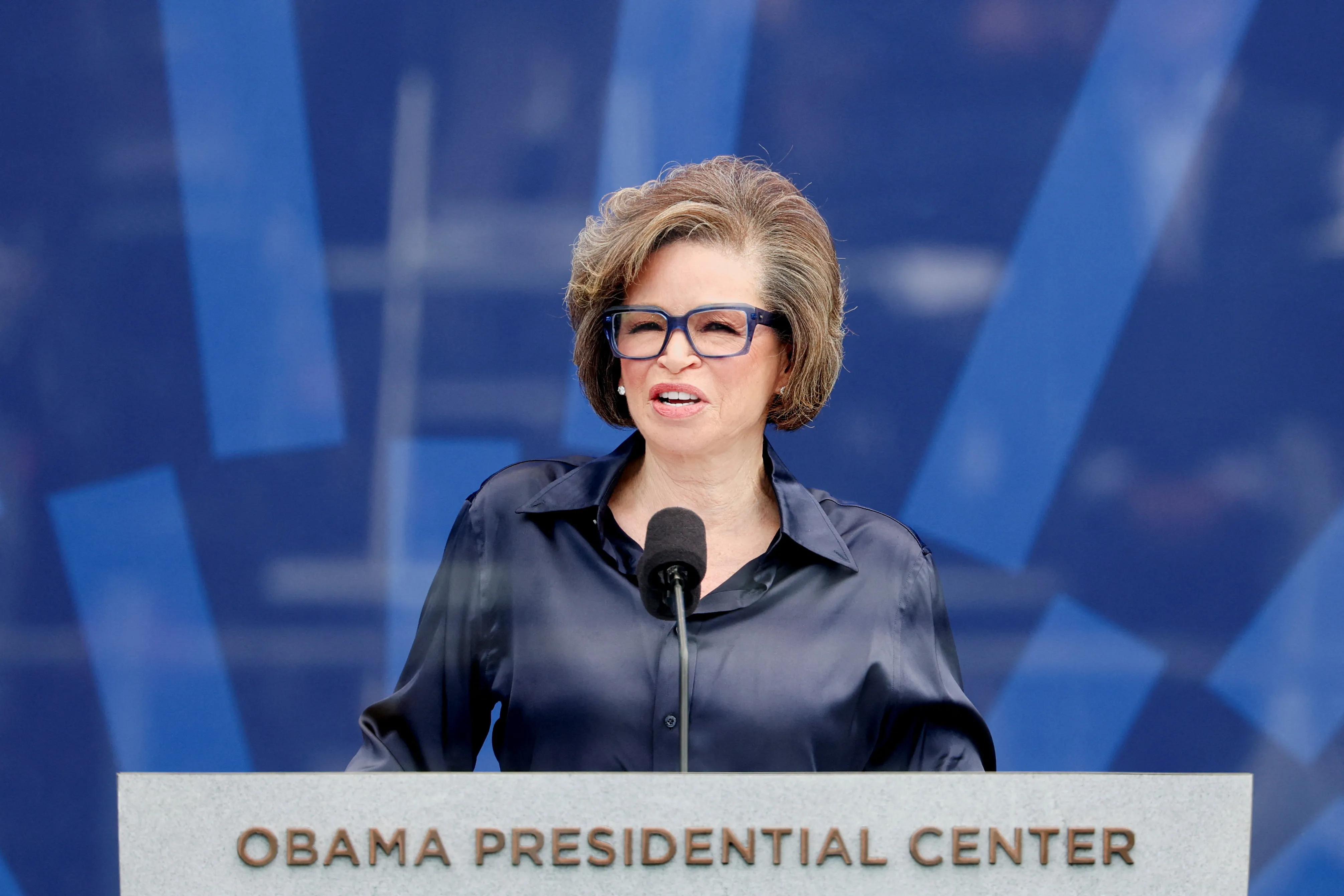 Valerie Jarrett, CEO of The Obama Foundation, speaks at a podium with 
