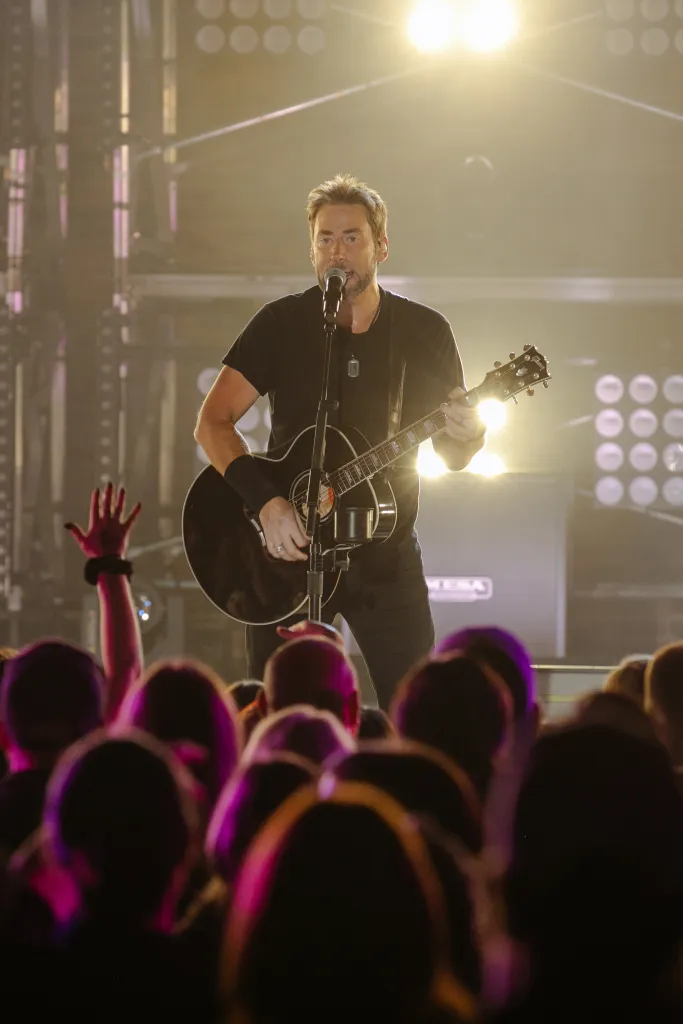 Chad Kroeger performing on stage at CMT Crossroads.