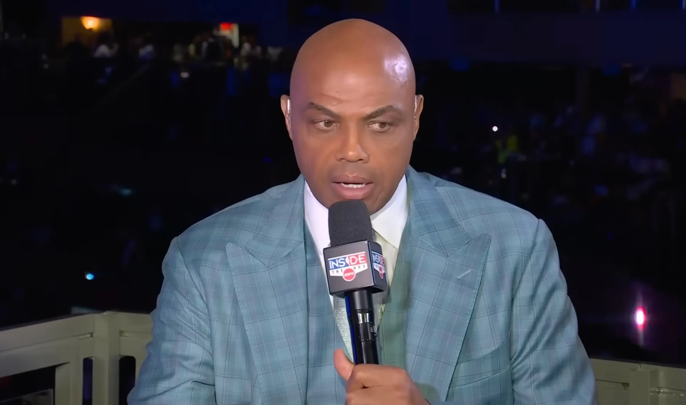 Charles Barkley speaking into a microphone.