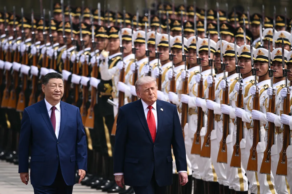 US President Donald Trump and China's President Xi Jinping inspect a guard of honor during a welcome ceremony in Beijing.