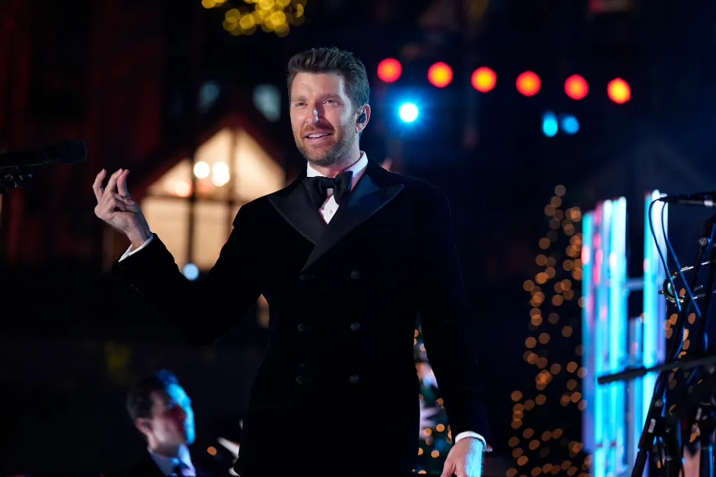 Brett Eldredge performing on stage at Christmas in Rockefeller Center.