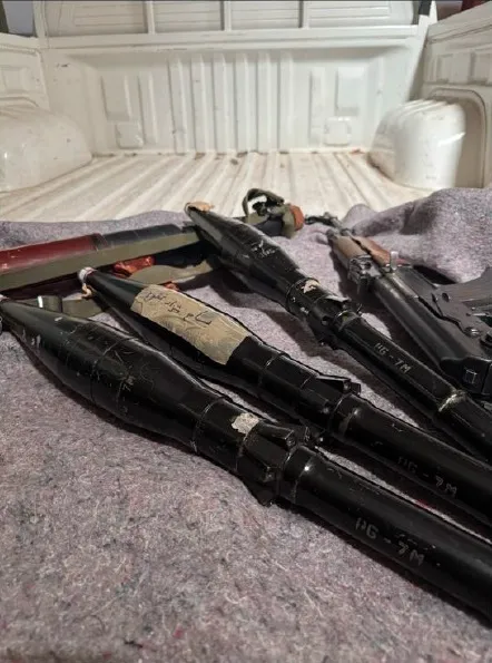 Firearms and RPGs, one with 