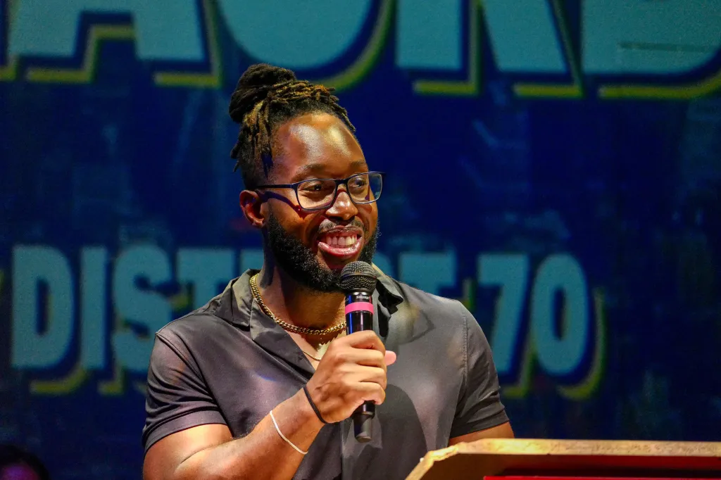 Conrad Blackburn speaking at A City to Win Rally.
