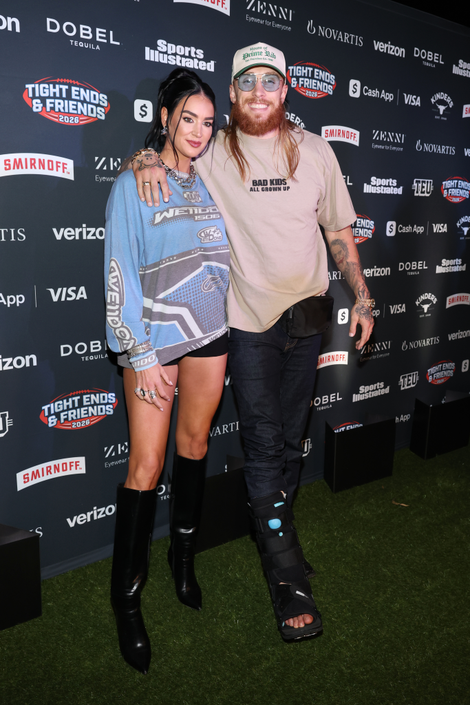 Claire and George Kittle pose together at the 