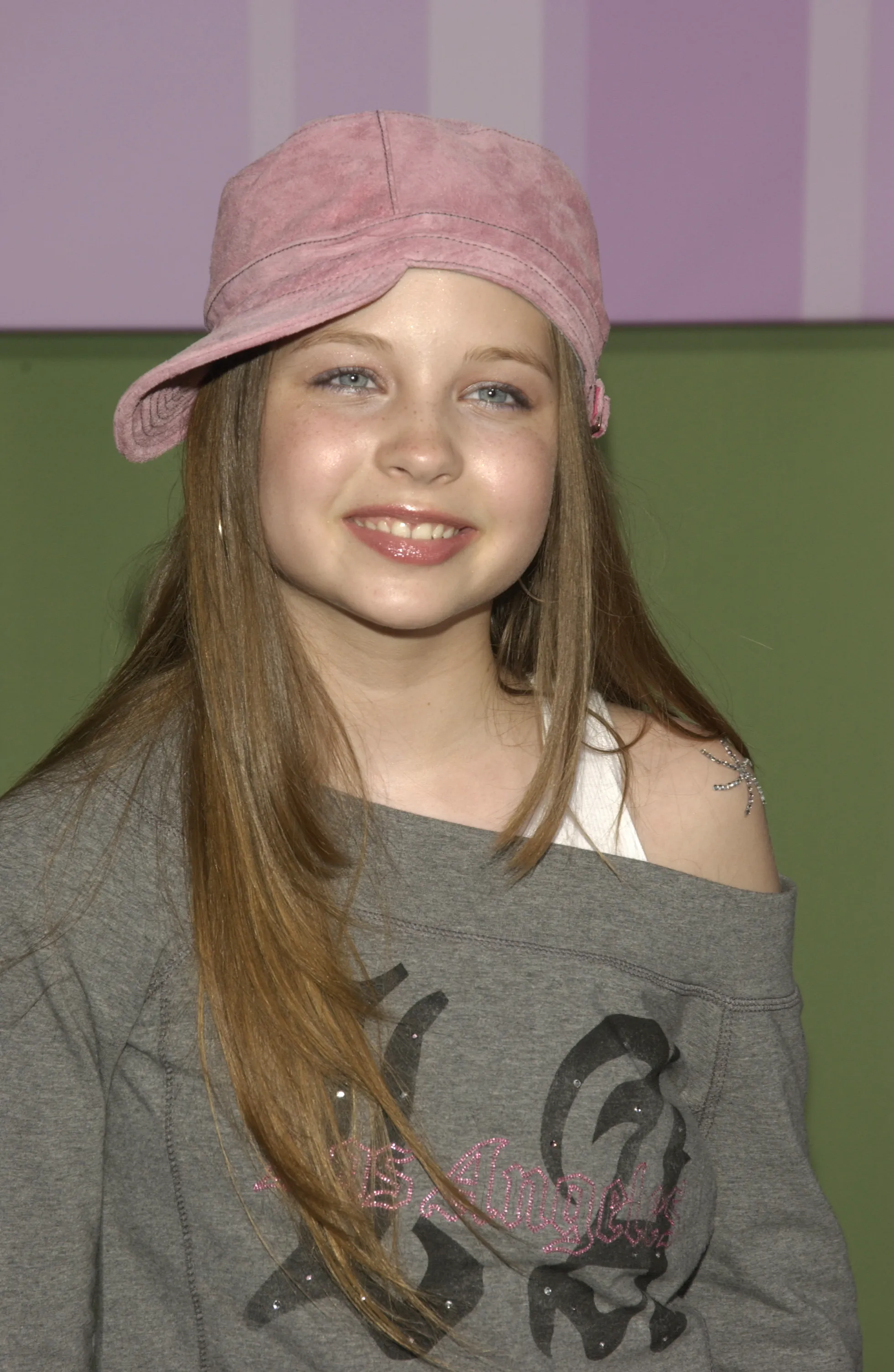 Daveigh Chase smiling at the Hollywood premiere of Freaky Friday.