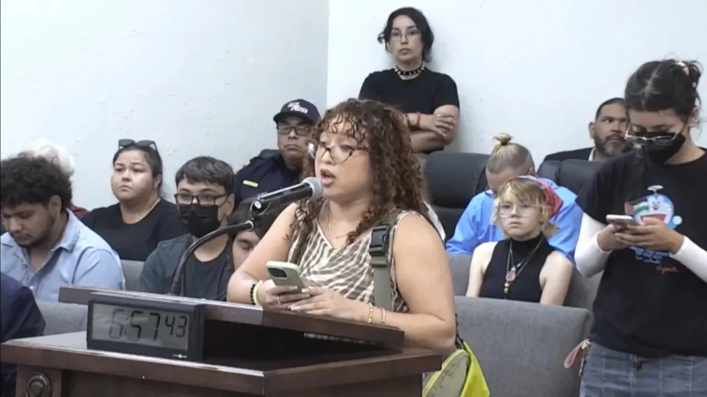 Stephanie Ambriz speaking at a public meeting about a data center moratorium.