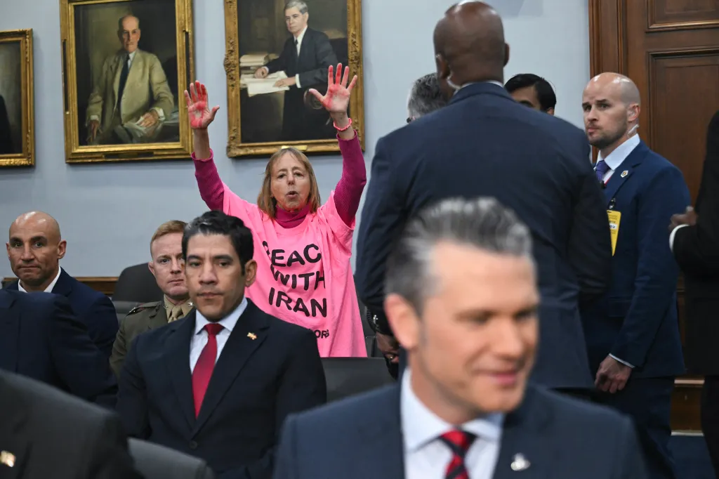 Code Pink protestor Medea Benjamin in a pink t-shirt with 