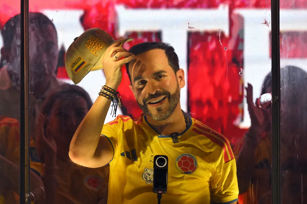 Colombia's presidential candidate Abelardo de la Espriella, of the Salvadores de la Patria movement, gestures as he speaks to supporters behind bulletproof glass after a quick count of votes in the presidential election at the Ventana al Mundo monument in Barranquilla, Colombia, on May 31, 2026.