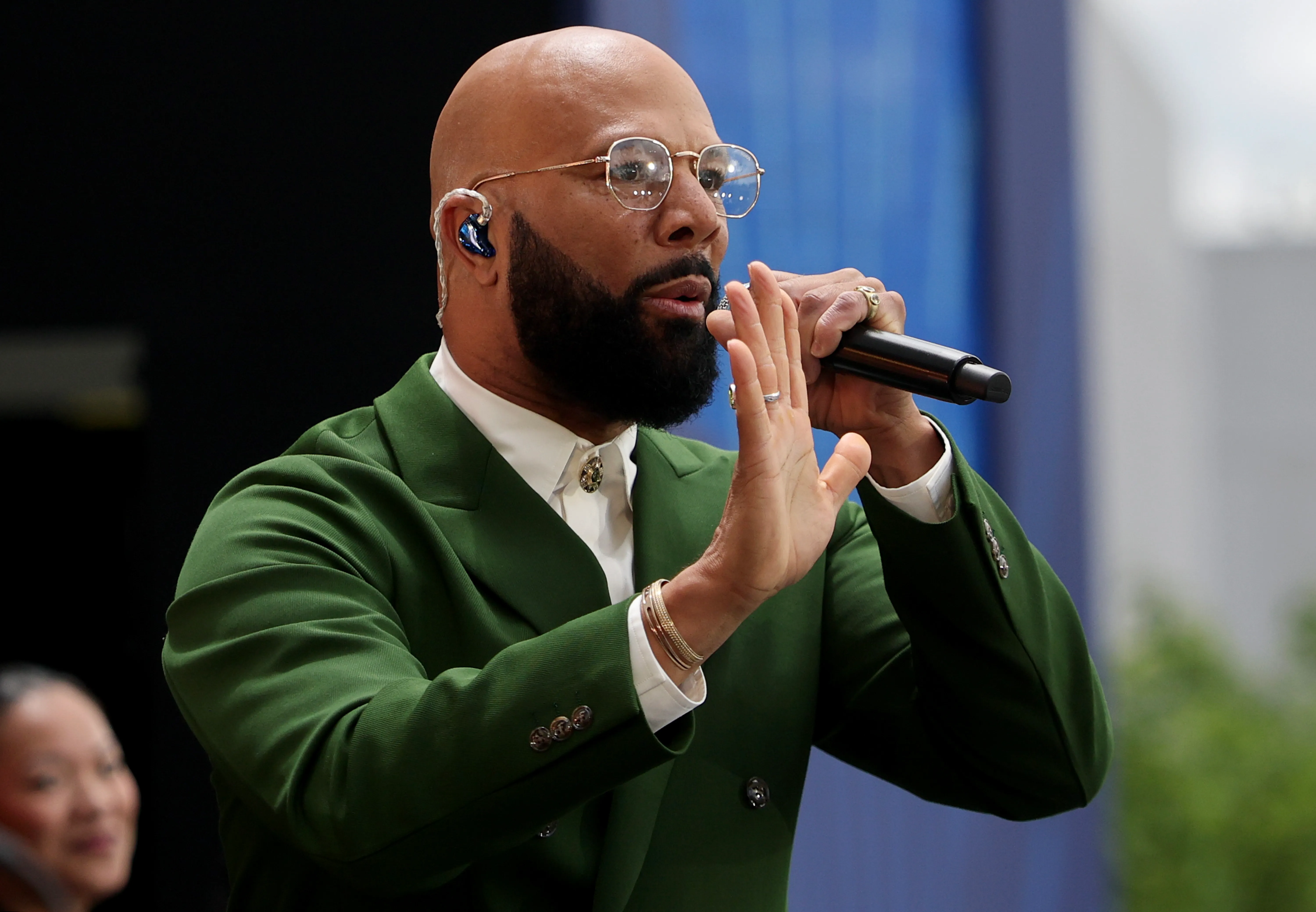 Common performs during the dedication ceremony for the opening of the Barack Obama Presidential Center.
