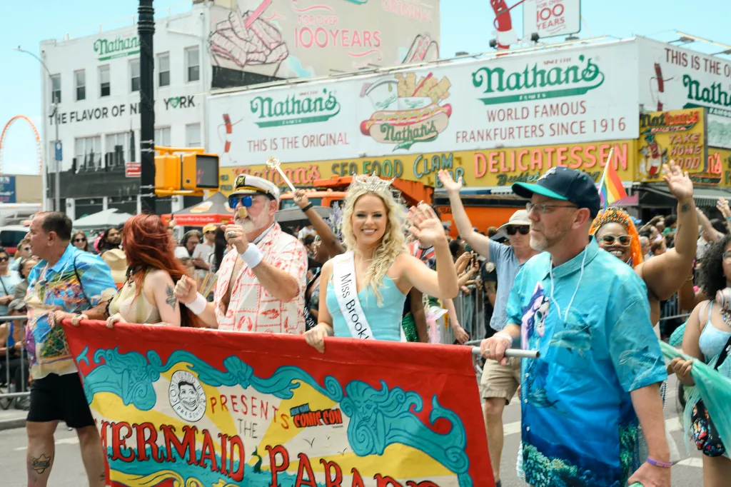 Marchers walk in the parade.