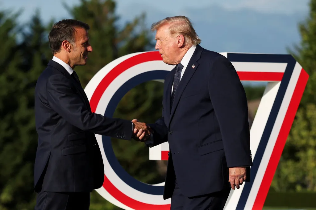 Macron greets U.S. President Donald Trump during the G7 Summit at Hotel Royal Evian on June 15, 2026 in Evian-les-Bains, France.