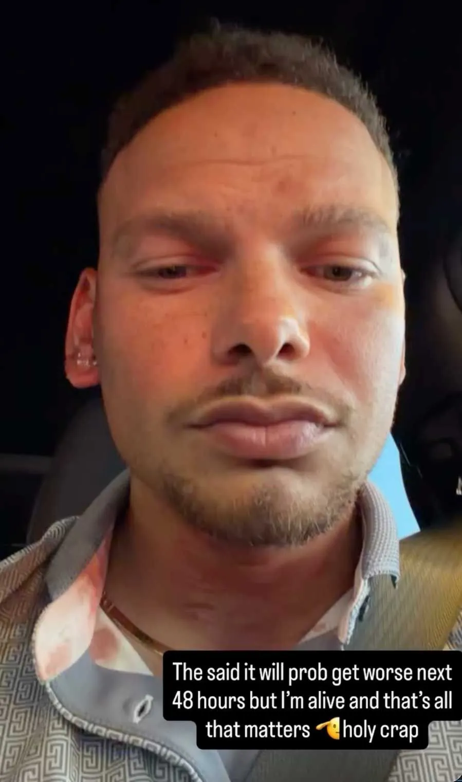 Country star Kane Brown's injured face with a quote about being glad to be alive after an accident.