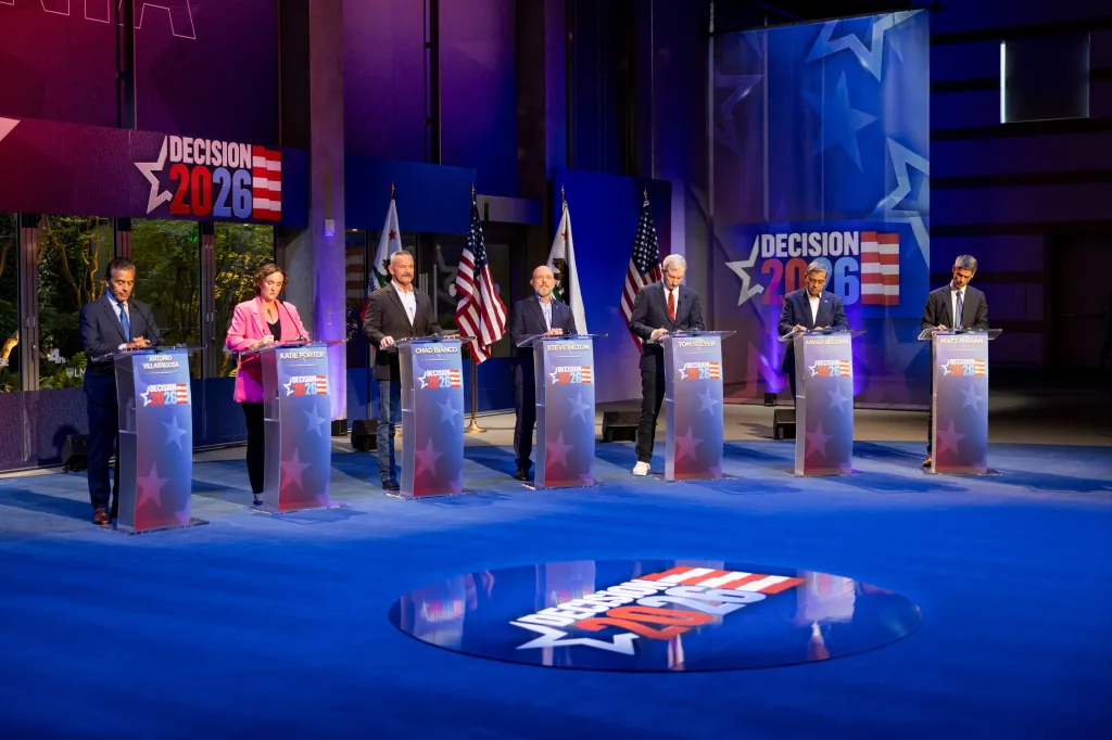 Seven candidates for California Governor, Antonio Villaraigosa, Katie Porter, Chad Bianco, Steve Hilton, Tom Steyer, Xavier Becerra, and Matt Mahan, at a debate.