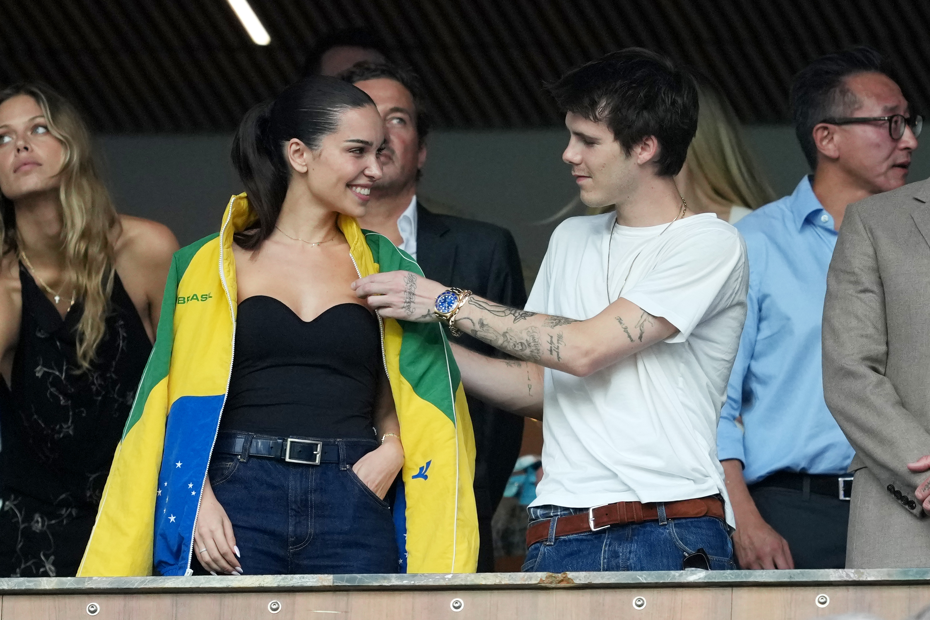 Cruz Beckham and Jackie Apostel in the stands during the FIFA World Cup 2026.
