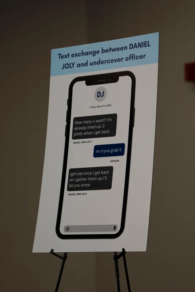 Display board showing a text exchange between Daniel Joly and an undercover officer regarding a drug transaction.