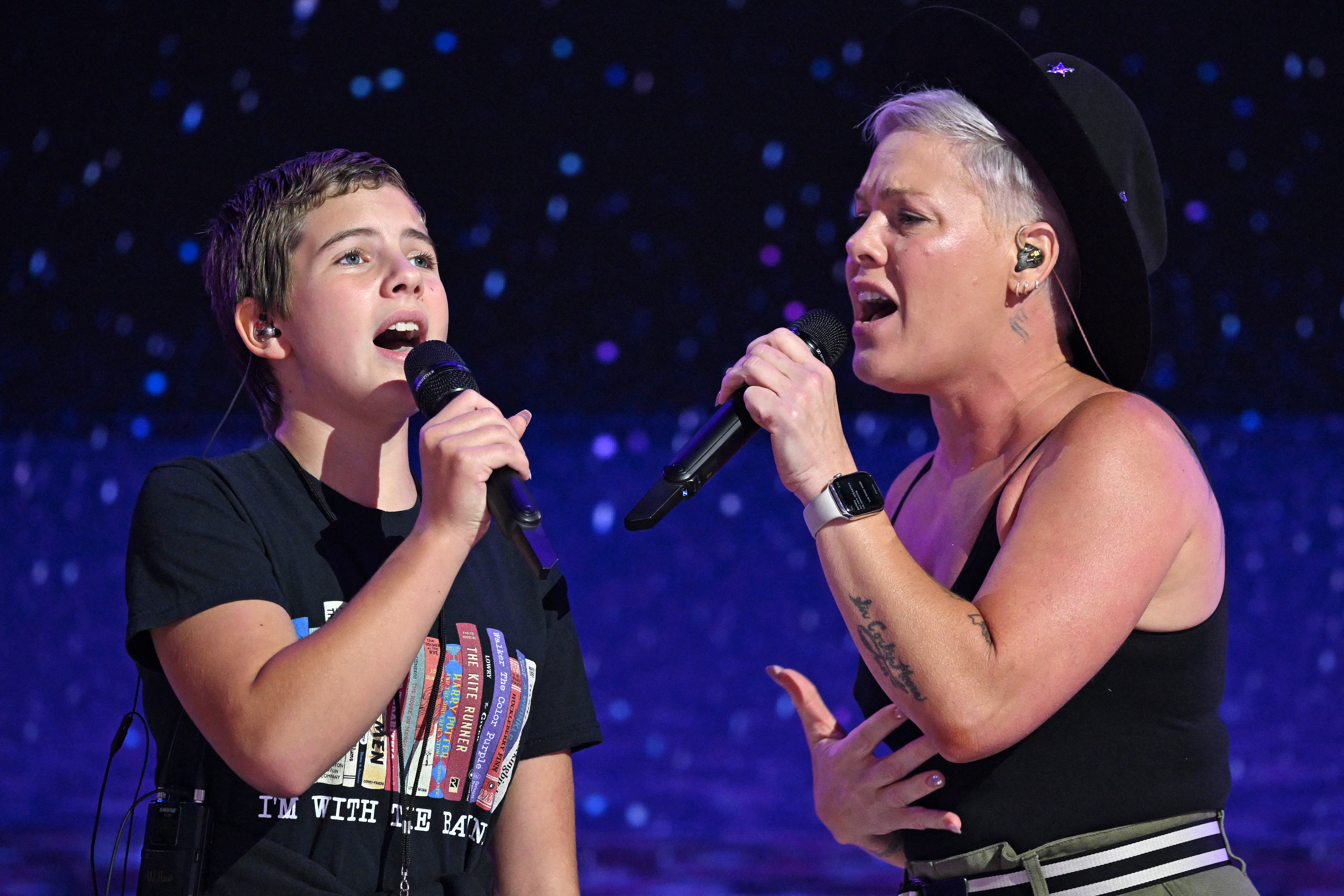 Pink and her daughter Willow perform a sound check at the Democratic National Convention.