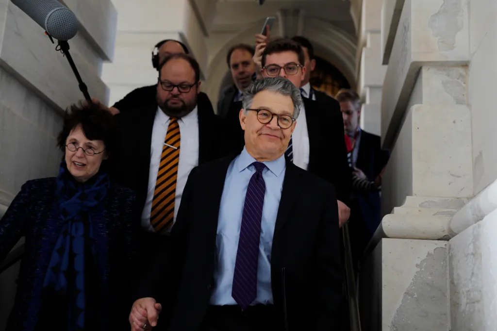 U.S. Senator Al Franken departing the U.S. Capitol with his wife, Franni, after announcing his resignation.