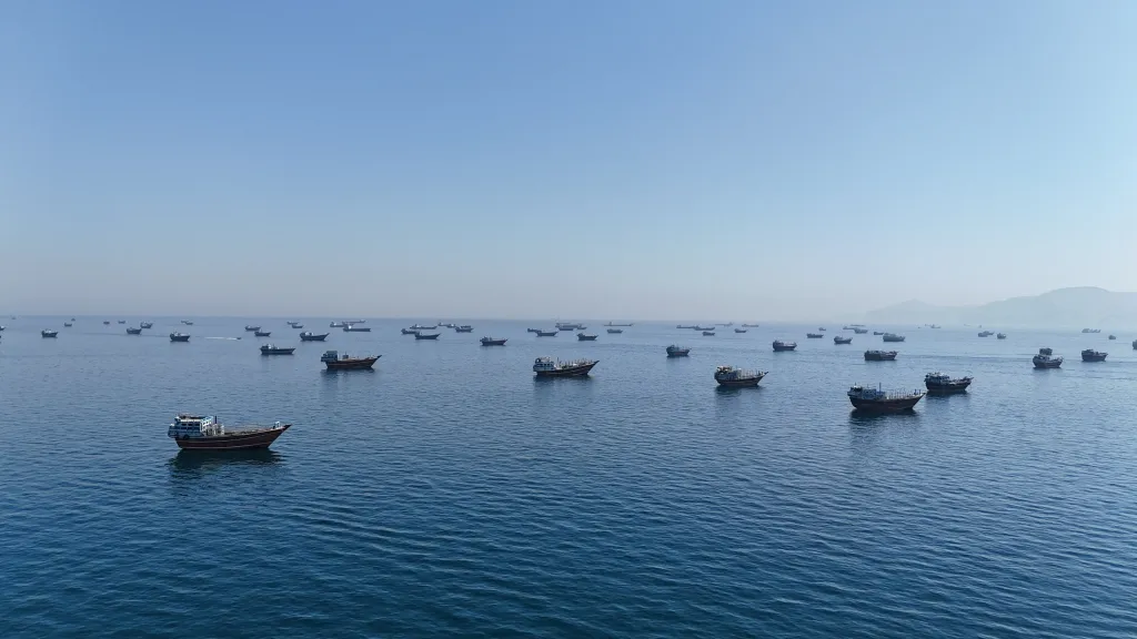 Drone view of many vessels anchored in the Strait of Hormuz.