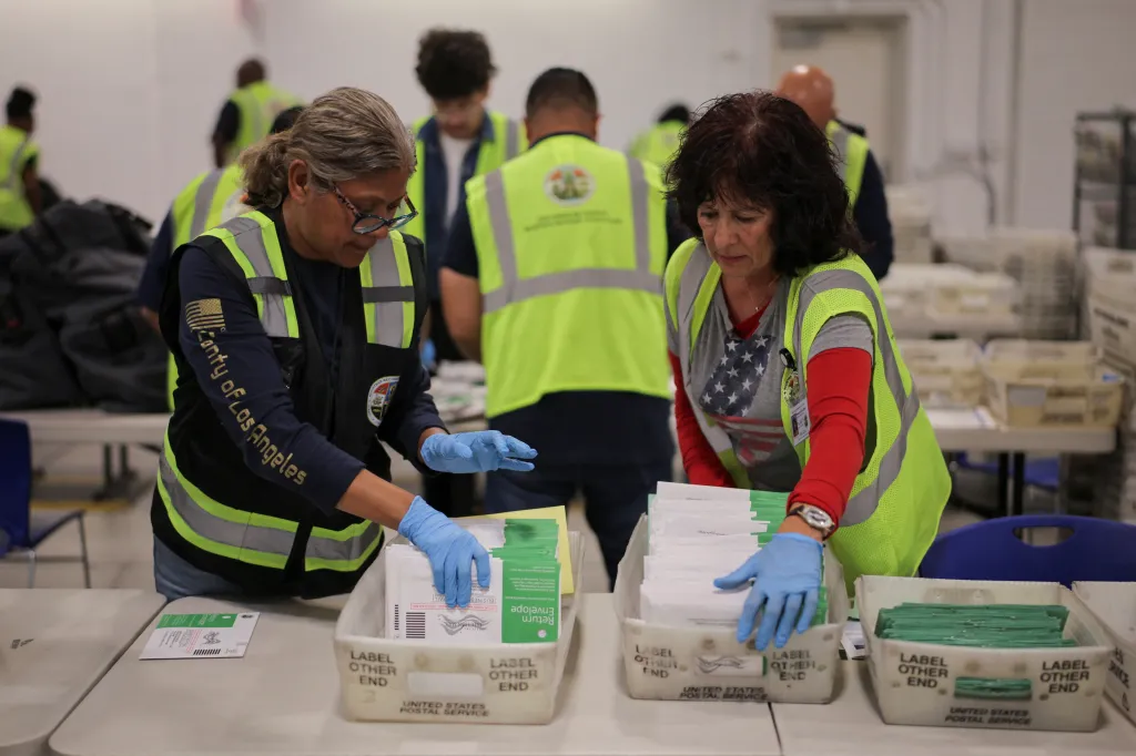 Election workers processing ballots at the Los Angeles County Ballot Processing Center.