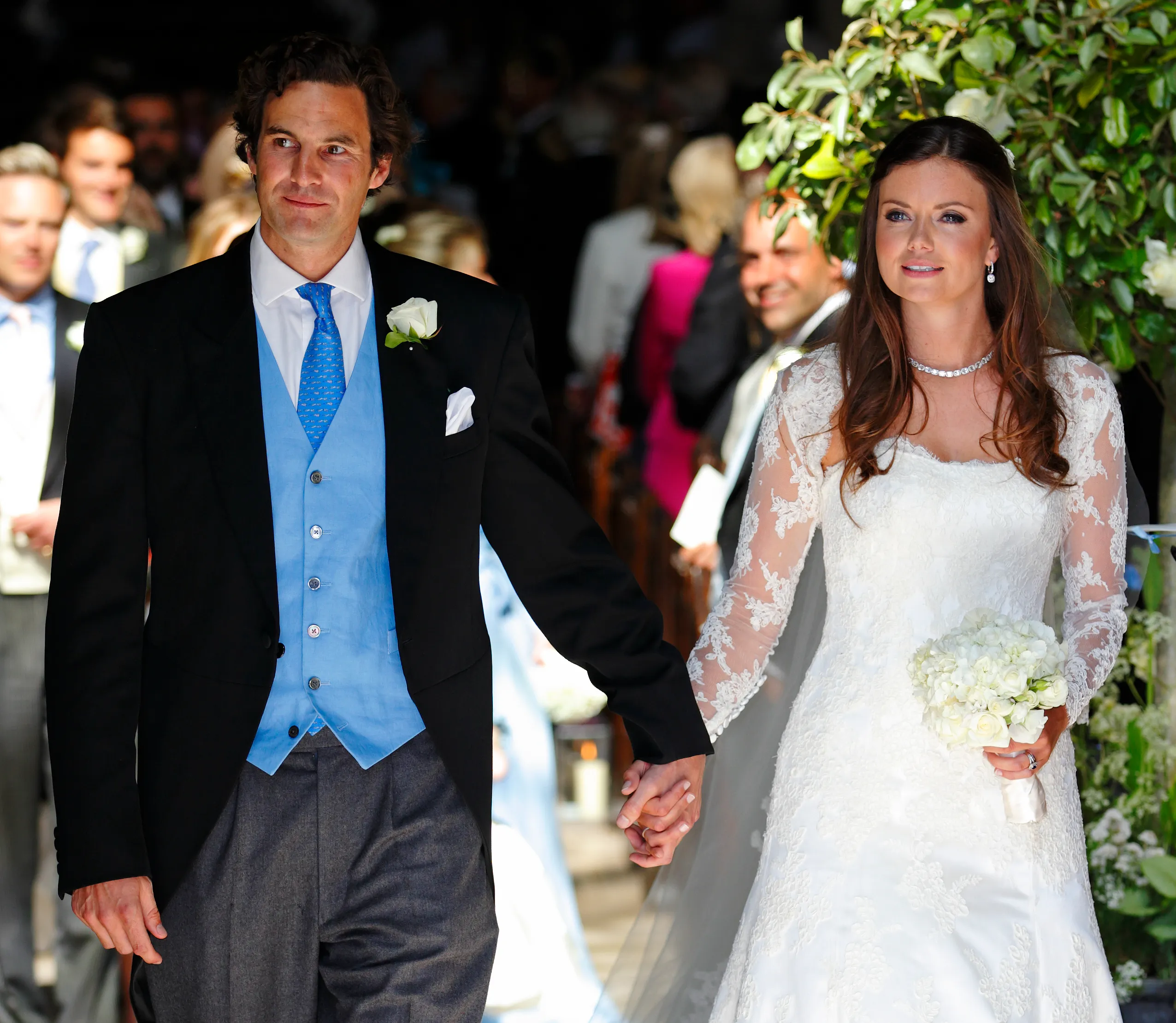 Rupert Finch and Lady Natasha Rufus Isaacs leaving the church after their wedding.
