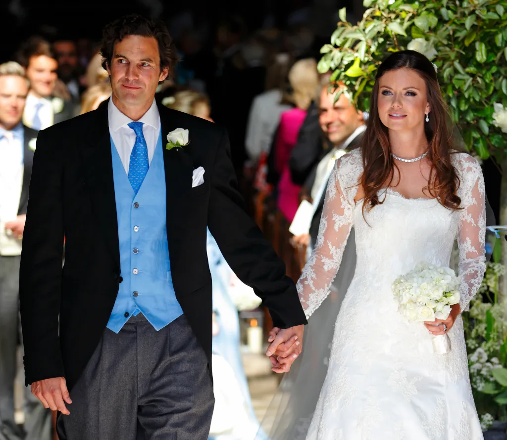 Rupert Finch and Lady Natasha Rufus Isaacs leaving the church after their wedding.