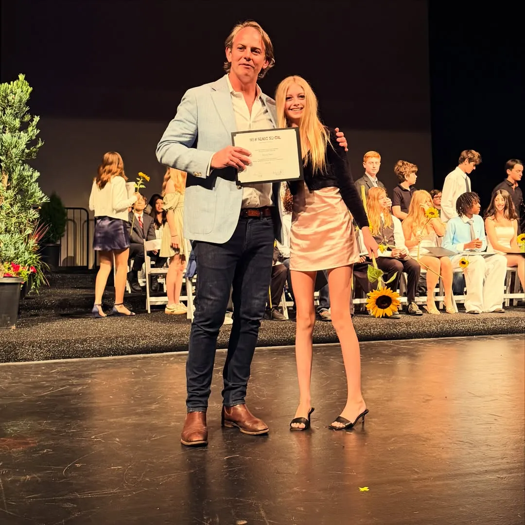 Eric Dane and his daughter, Georgia, celebrating her middle school graduation.