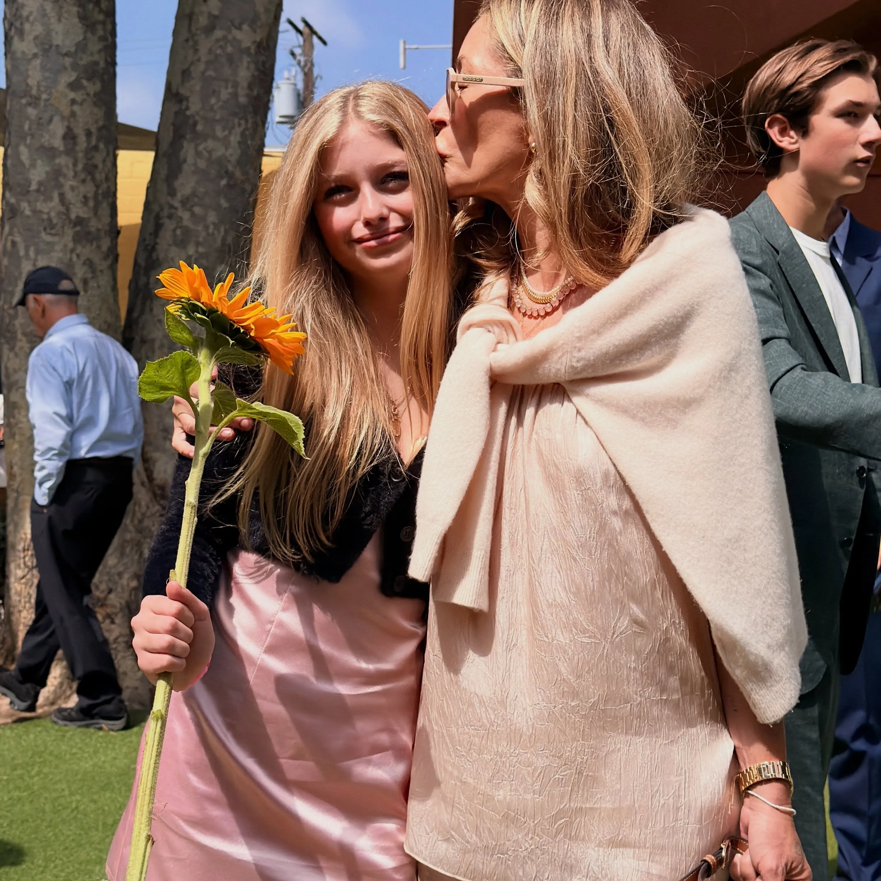 Rebecca Gayheart kissing daughter Georgia Dane on the cheek.