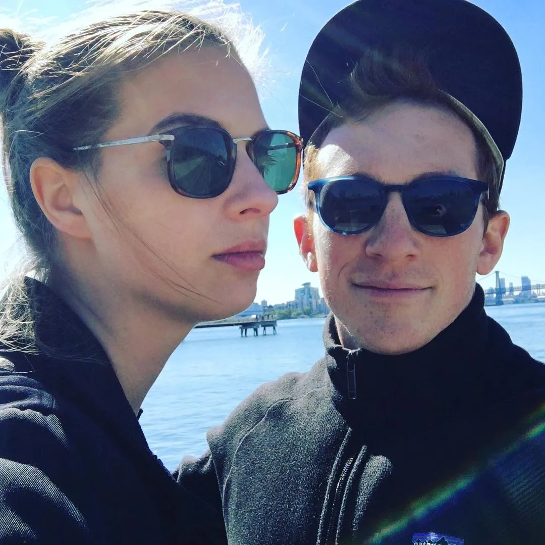Ethan Slater and his wife Lilly Jay pose for a selfie by the water.