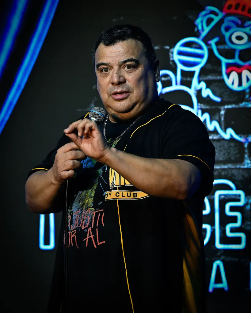 Comedian Carlos Mencia performing at The Ice House Comedy Club.