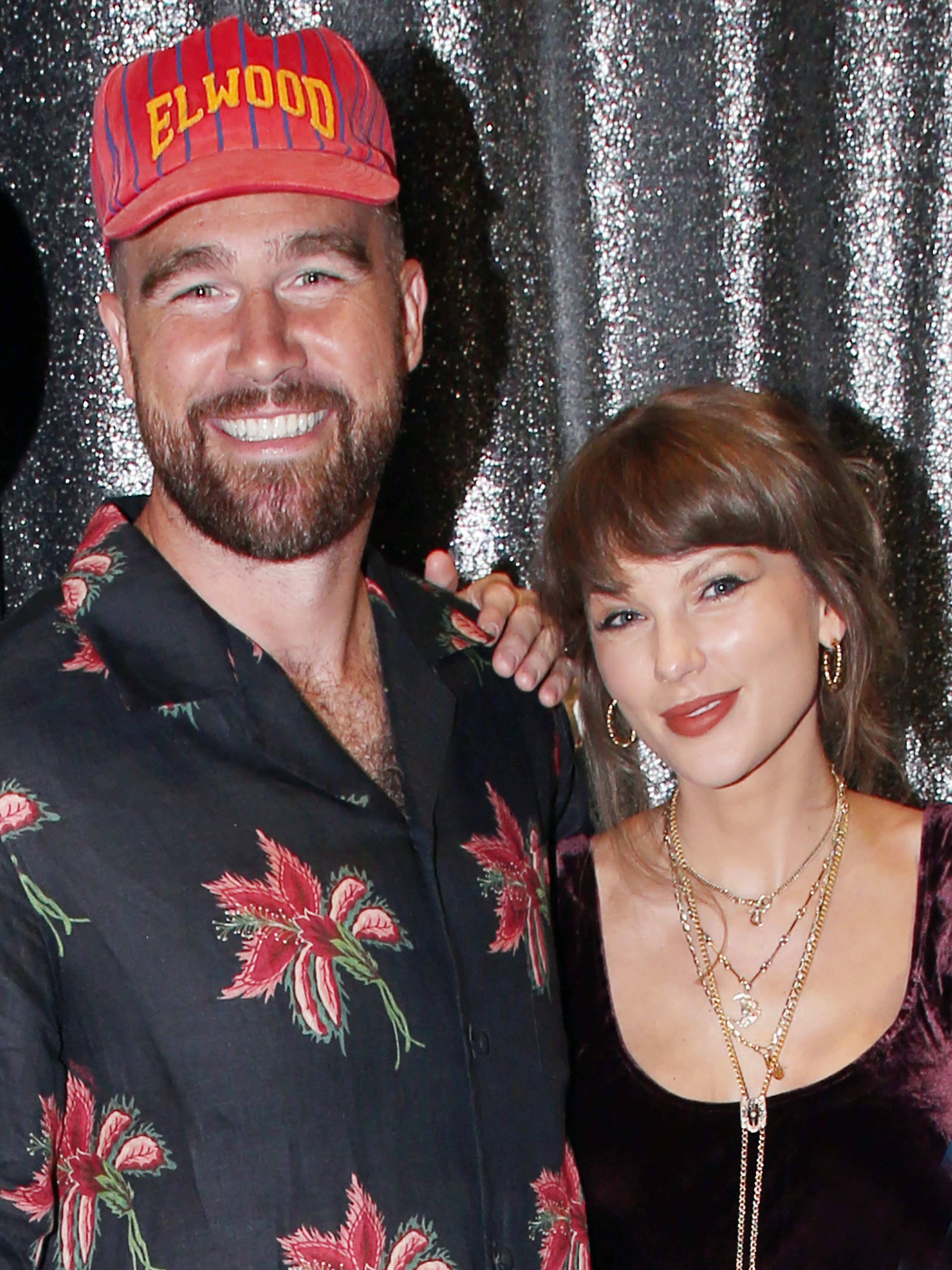 Taylor Swift and Travis Kelce pose together at a Broadway show.