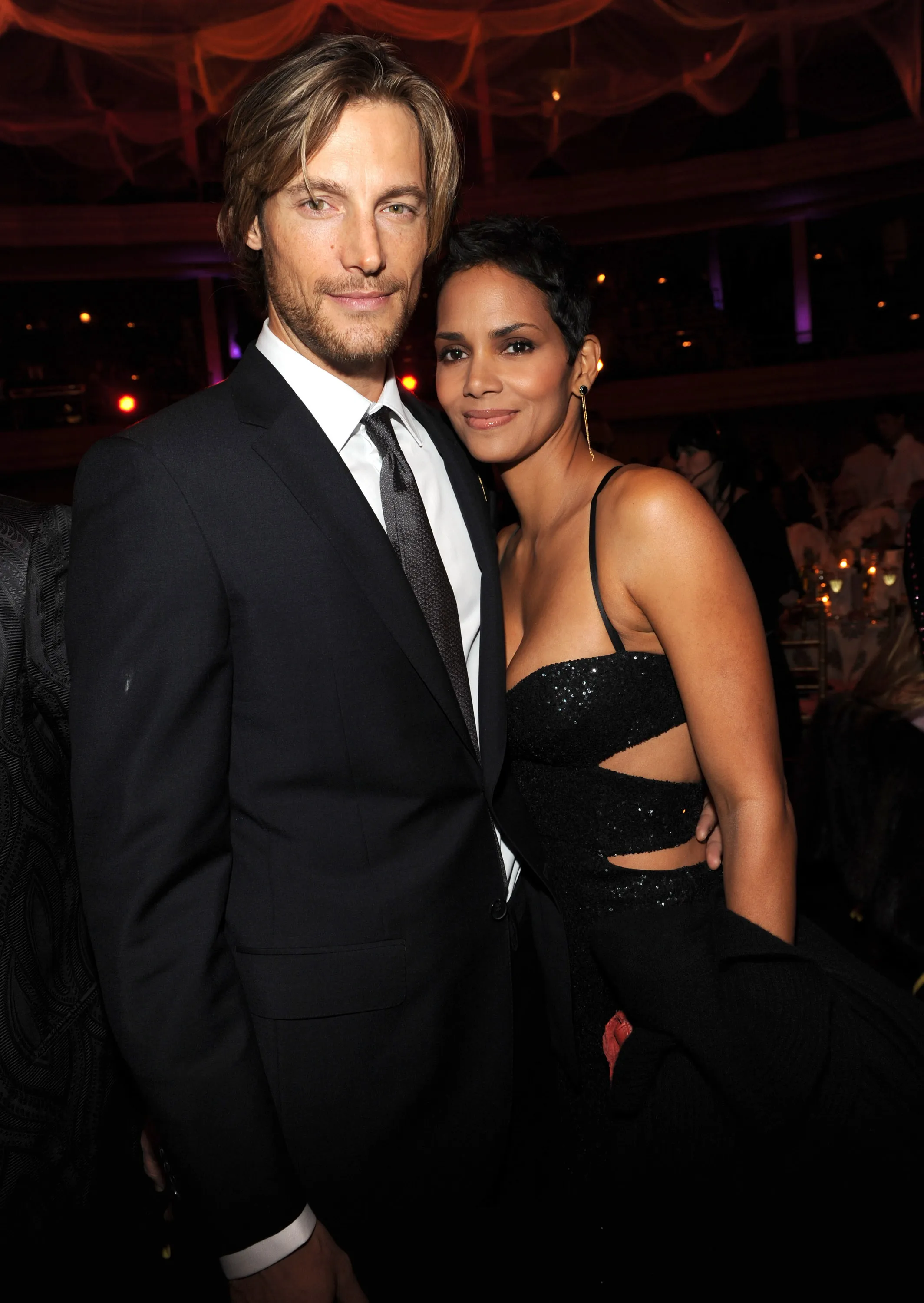 Olivier Martinez and Halle Berry smiling.