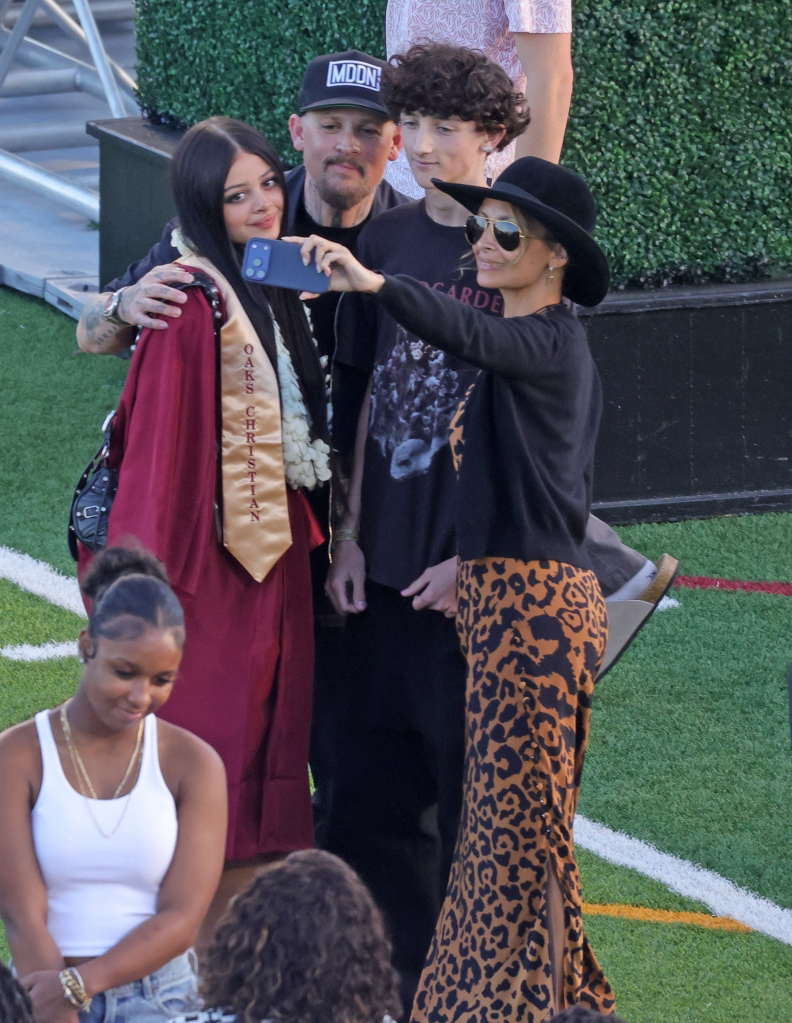 Nicole Richie taking a selfie with Kate Richie Madden and Joel Madden after Kate's graduation ceremony.