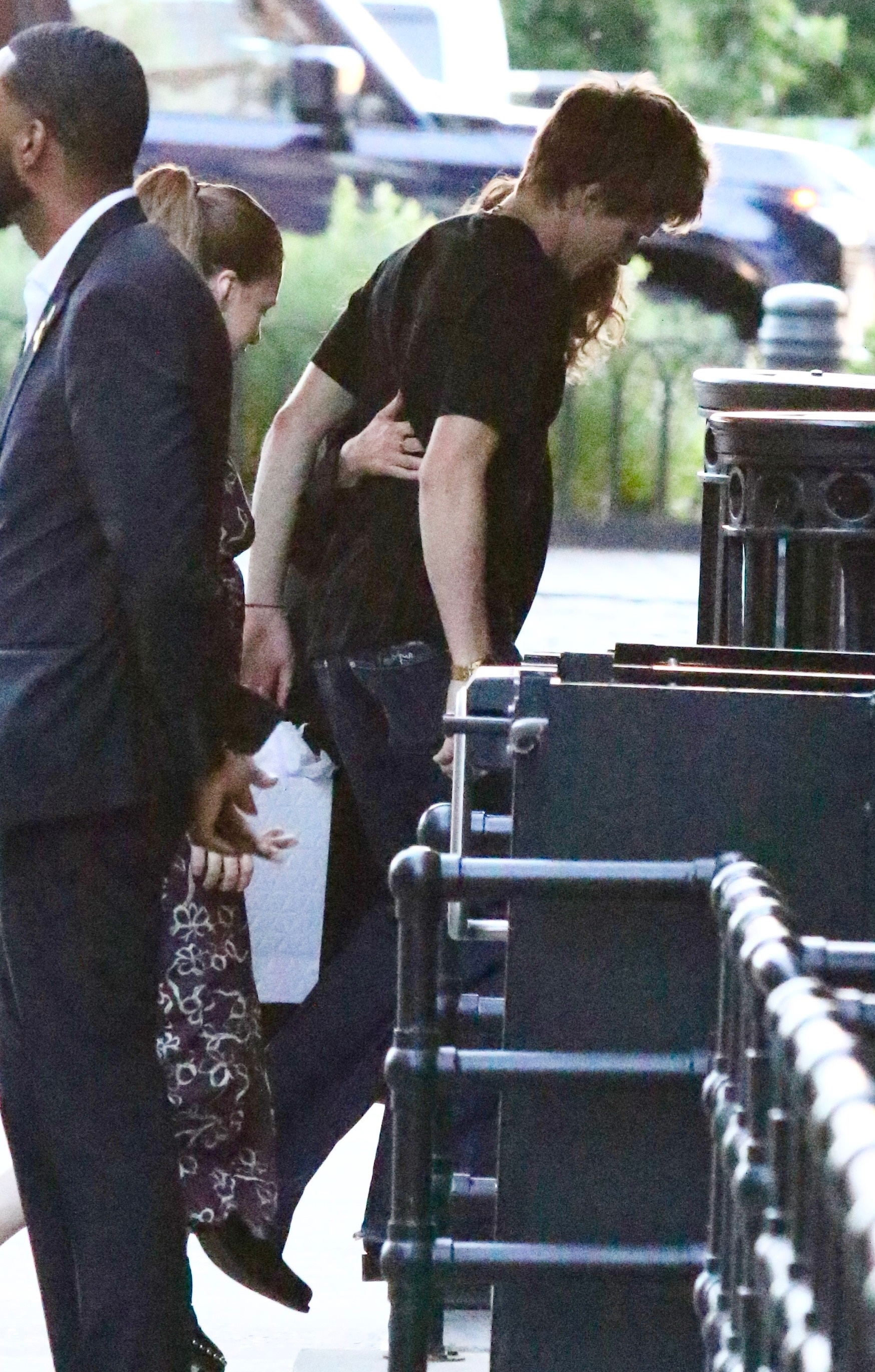 Julia Roberts with her arm around her son Henry as they walk into the Jane Hotel.