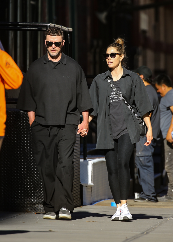 Justin Timberlake and Jessica Biel holding hands while walking in New York City.