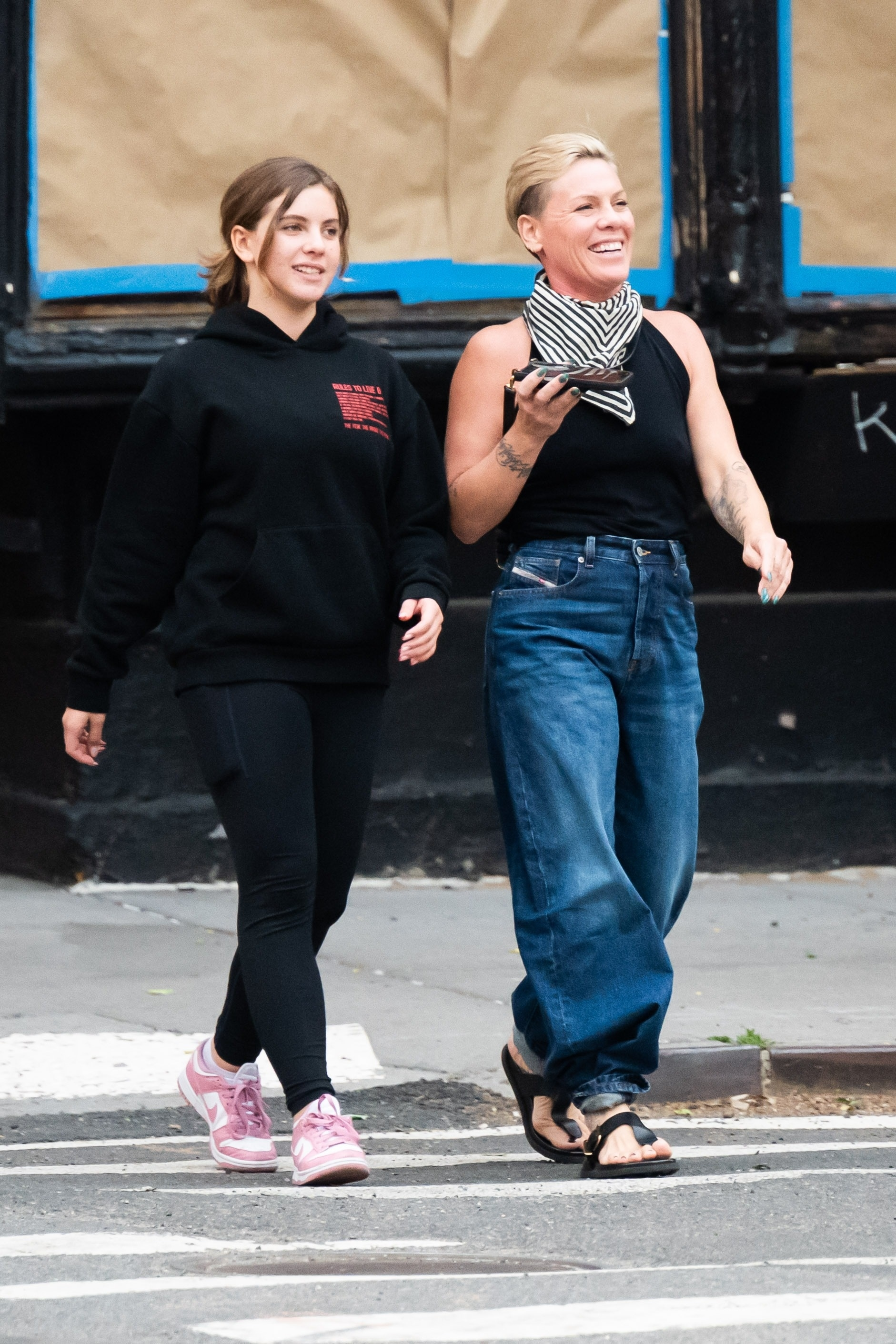 Pink and daughter Willow walking together.