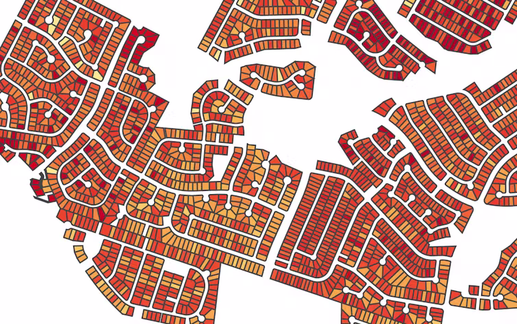 A map of homes in a neighborhood shows how low and high risk homes are mixed together