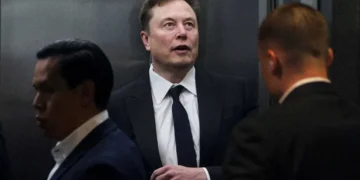 ‘Dark day’: Elon Musk’s milestone draws searing rebuke