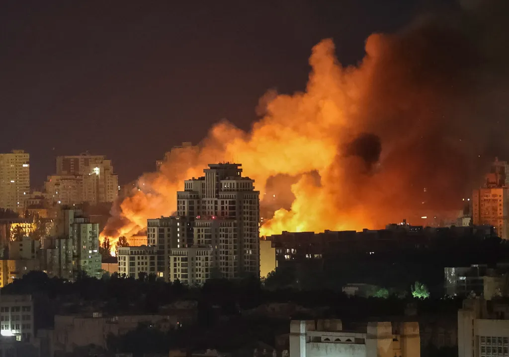Fire and smoke rise in the city during a Russian missile and drone strike, amid Russia's attack on Ukraine, in Kyiv, Ukraine June 15, 2026.