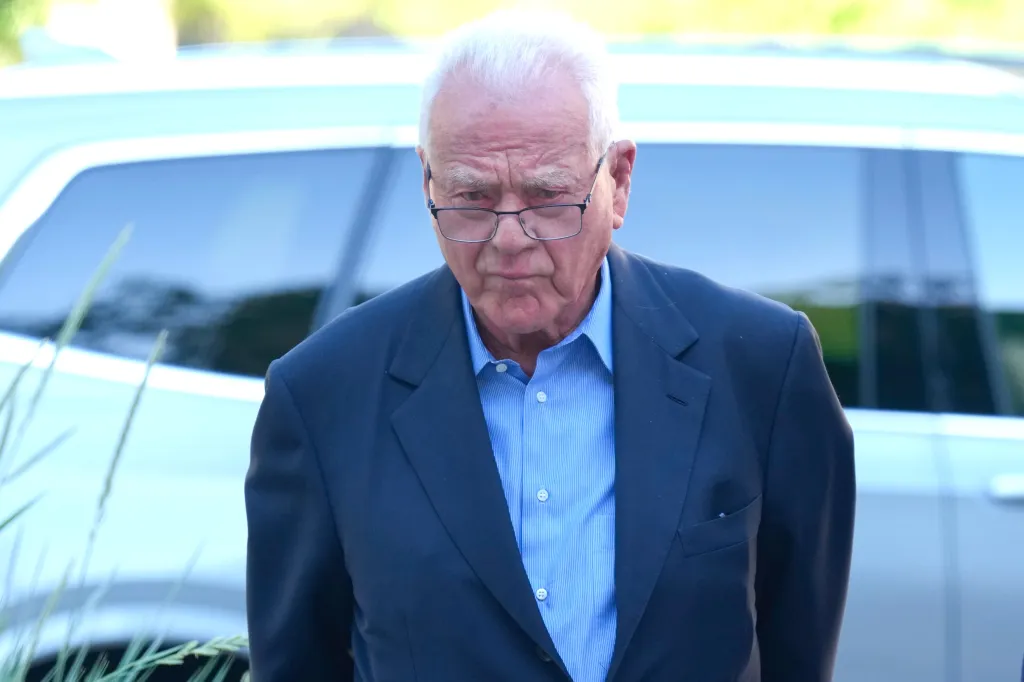 Frank Stronach arrives at a Toronto court.