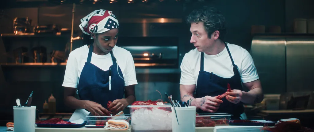 Ayo Edebiri as Sydney Adamu and Jeremy Allen White as Carmen 