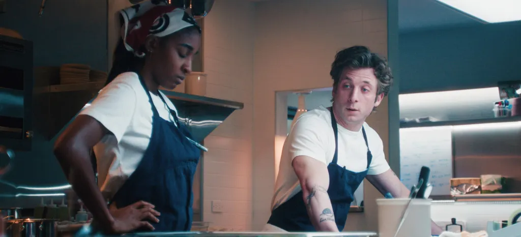 Ayo Edebiri as Sydney Adamu and Jeremy Allen White as Carmen 